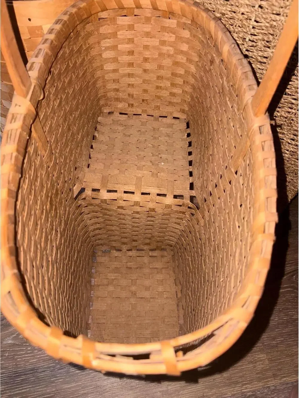 Woven reed stair-step storage basket.Vintage